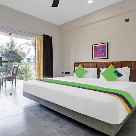 Treebo Grand Vistara Airport Suites Kochi エクステリア 写真
