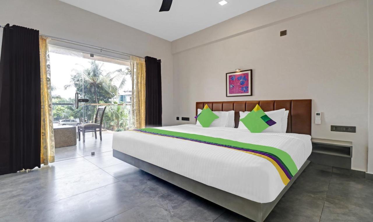 Treebo Grand Vistara Airport Suites Kochi エクステリア 写真