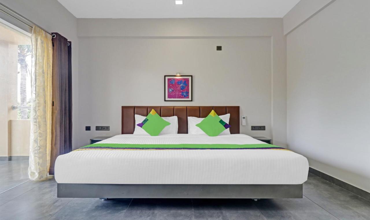 Treebo Grand Vistara Airport Suites Kochi エクステリア 写真