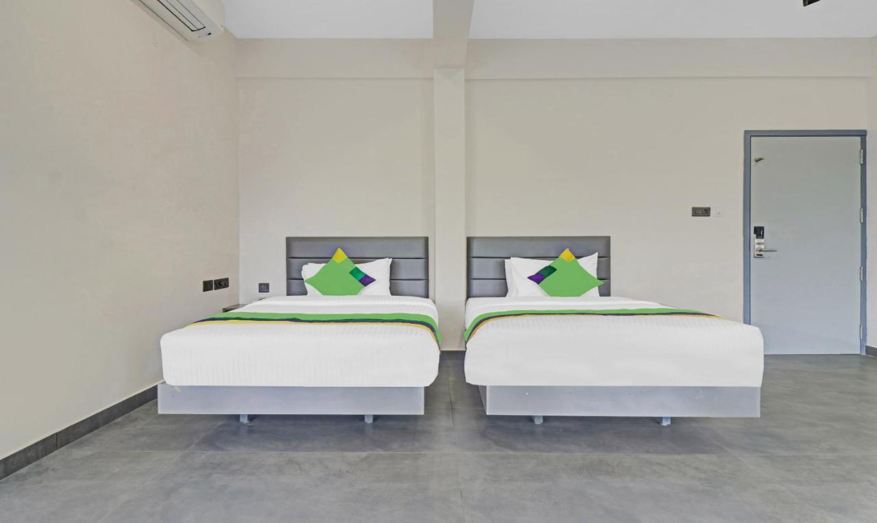 Treebo Grand Vistara Airport Suites Kochi エクステリア 写真
