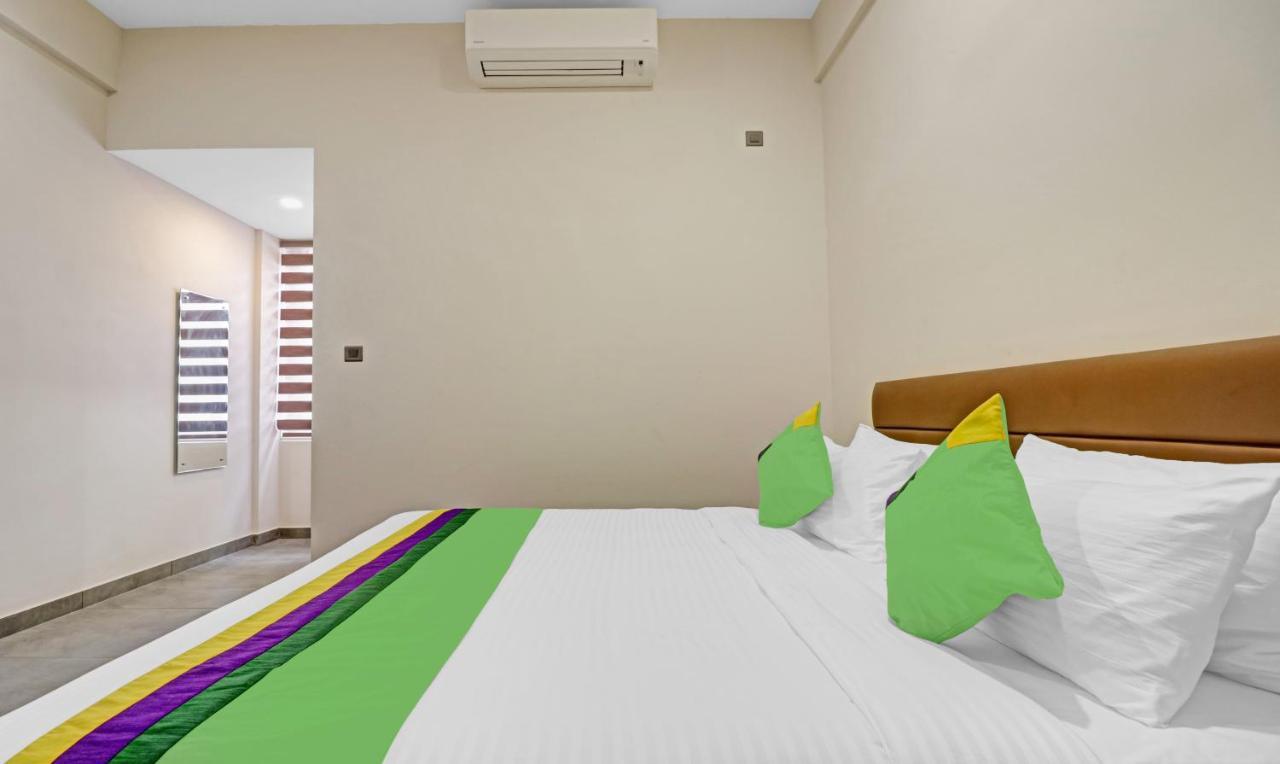 Treebo Grand Vistara Airport Suites Kochi エクステリア 写真