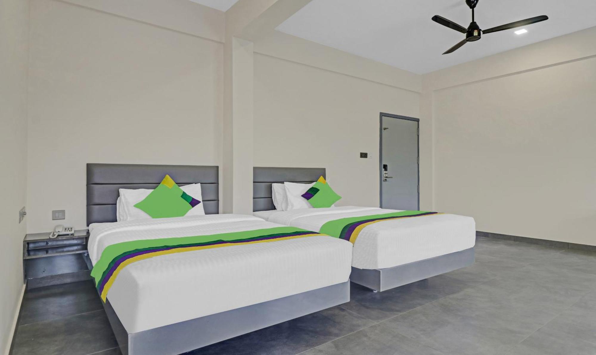 Treebo Grand Vistara Airport Suites Kochi エクステリア 写真